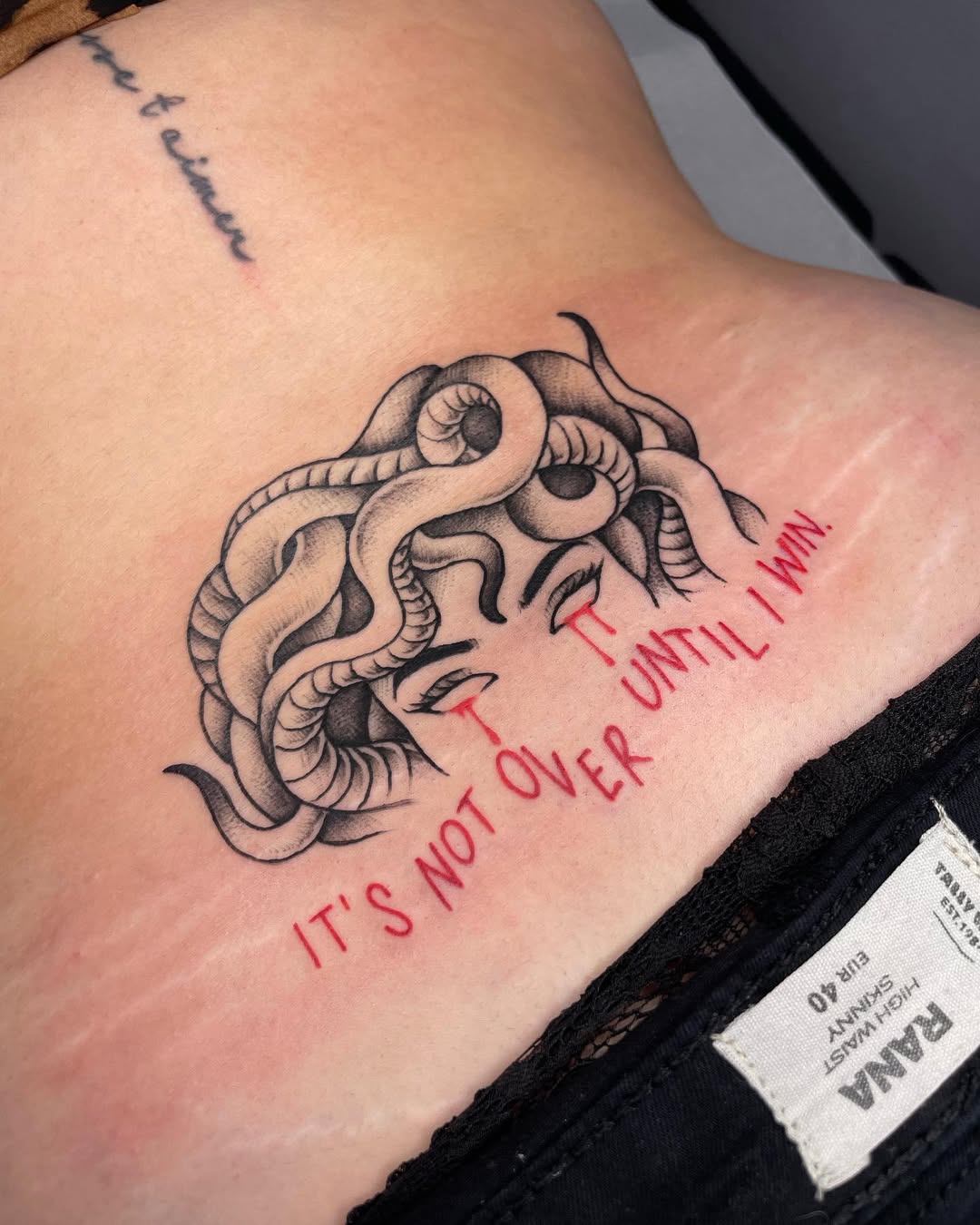 Edgy Medusa Tattoo with Empowering Quote