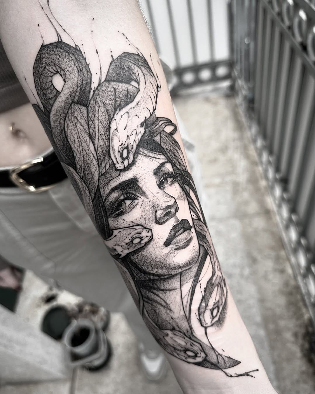 Striking Medusa-Inspired Tattoo with Serpents