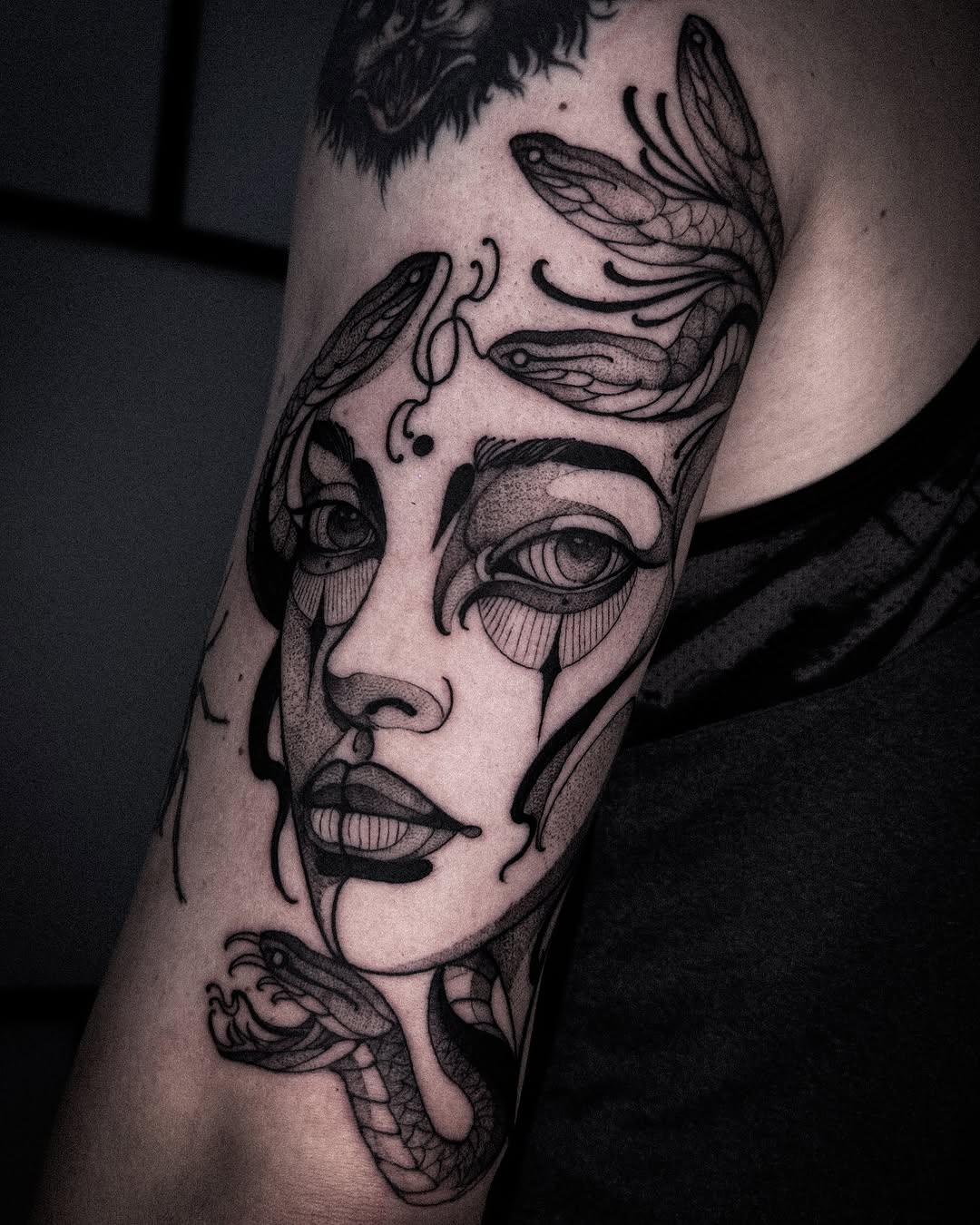 Intricate Medusa tattoo blending beauty and danger