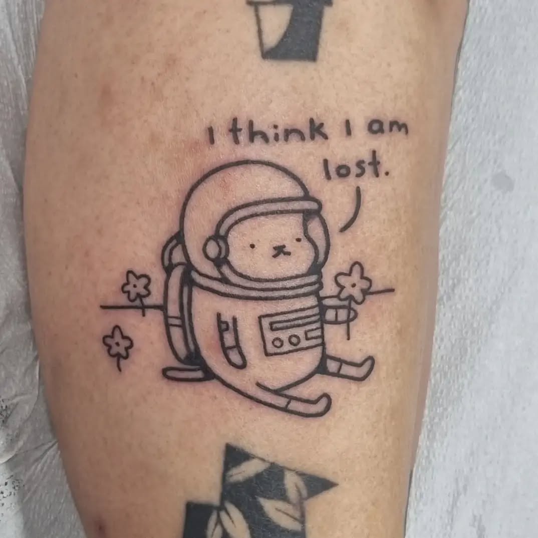 Cute astronaut cat tattoo with an emotional twist