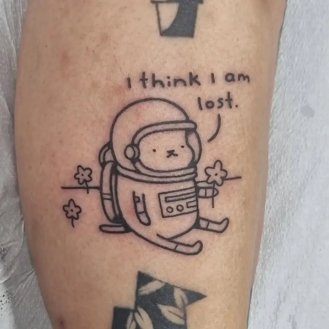 Cute astronaut cat tattoo with an emotional twist