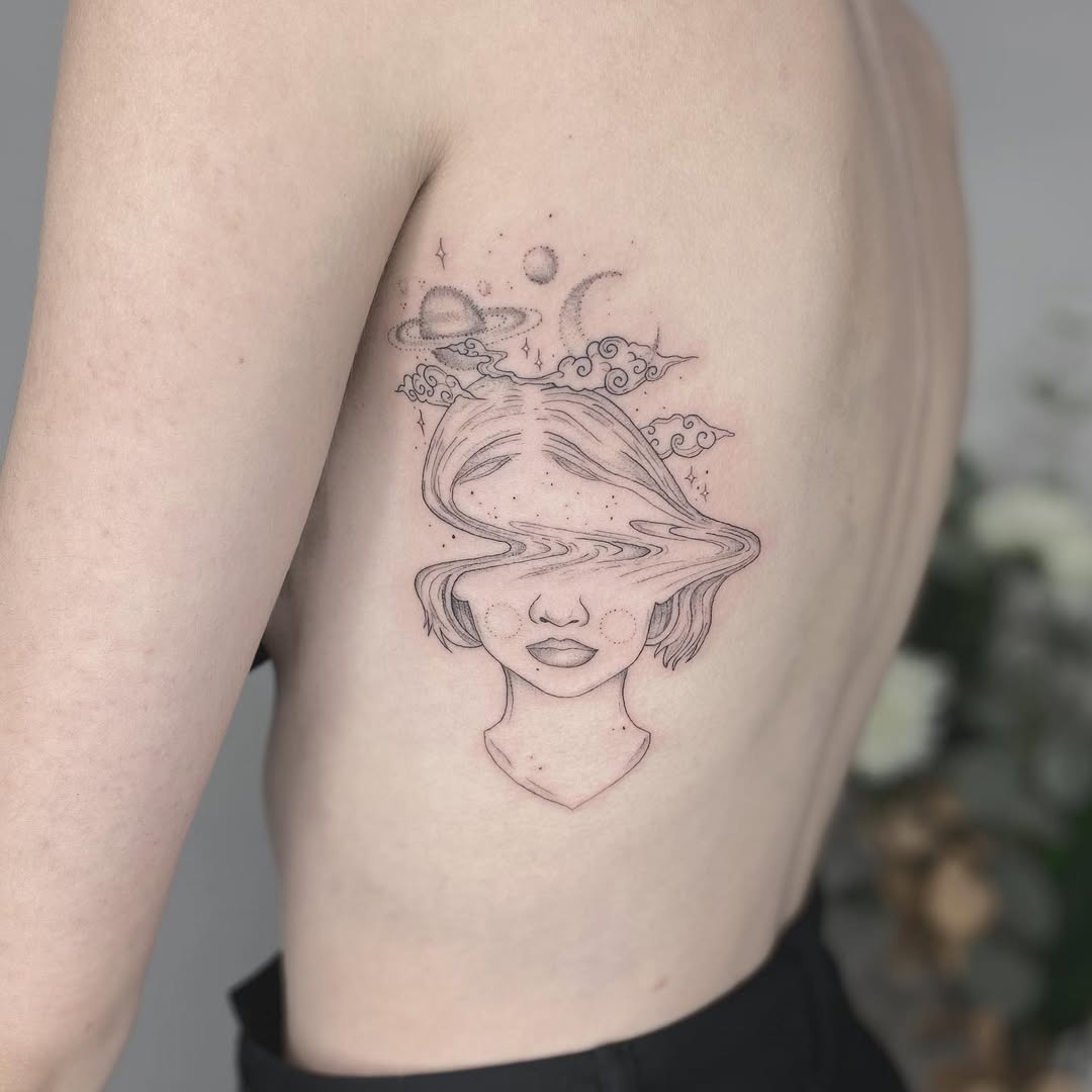 A dreamy tattoo of self-reflection and exploration