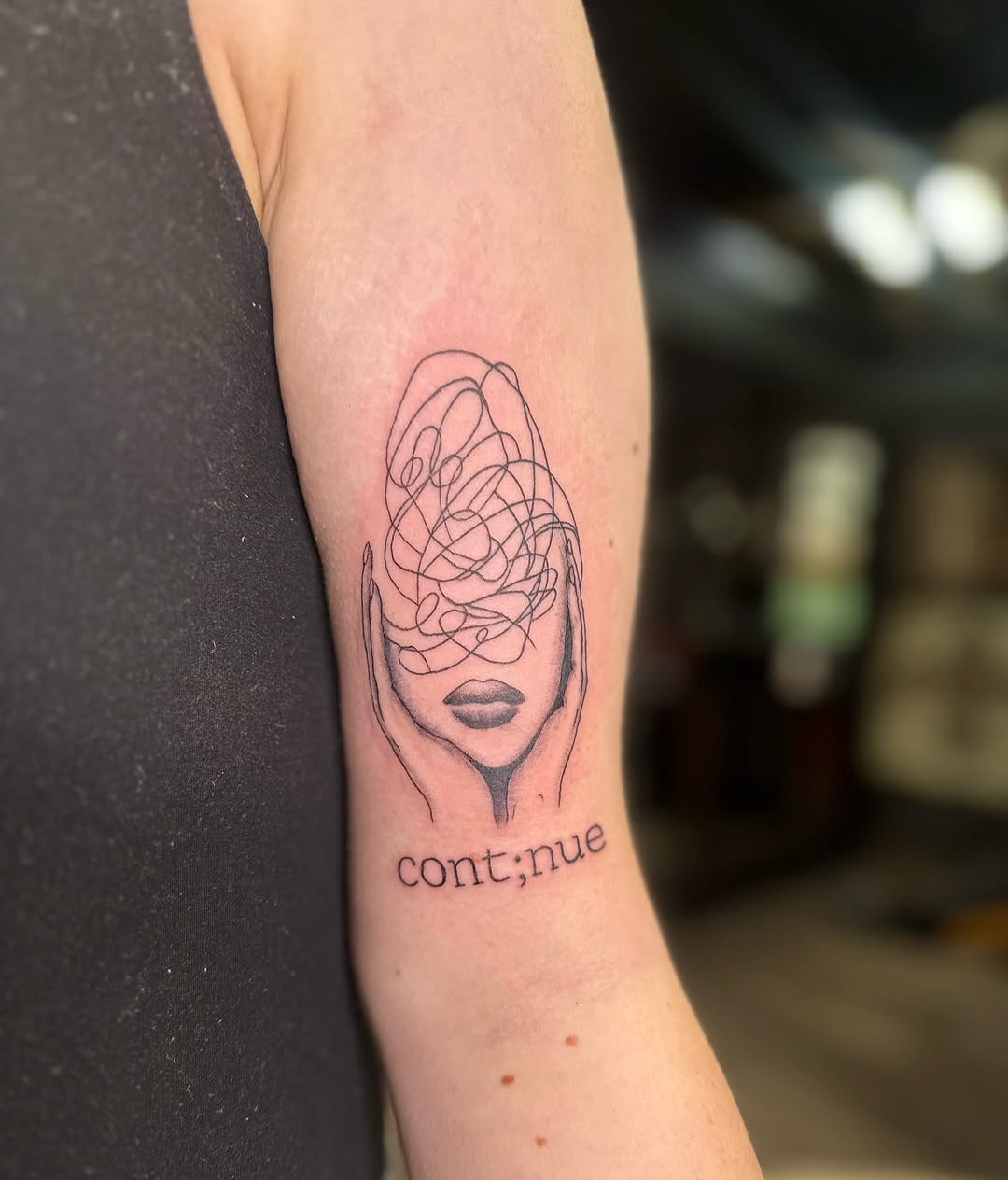 A symbolic tattoo representing mental resilience