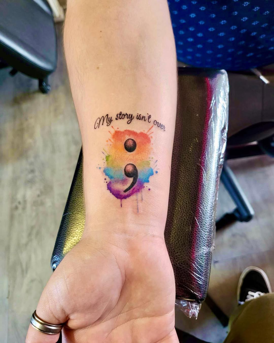 A vibrant semicolon tattoo with powerful meaning