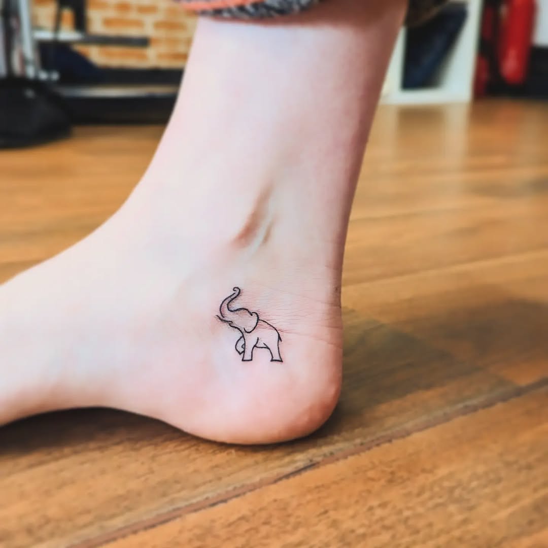 Elegant Minimalist Elephant Tattoo on Ankle