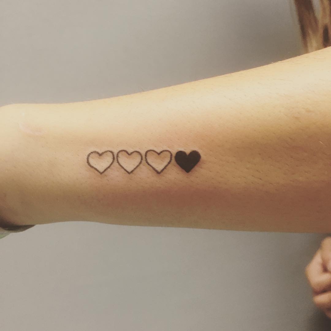 Charming minimalist heart tattoo variations