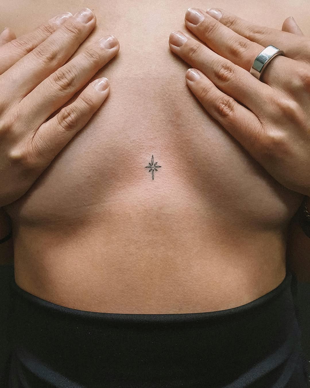 Elegant star tattoo on bare skin