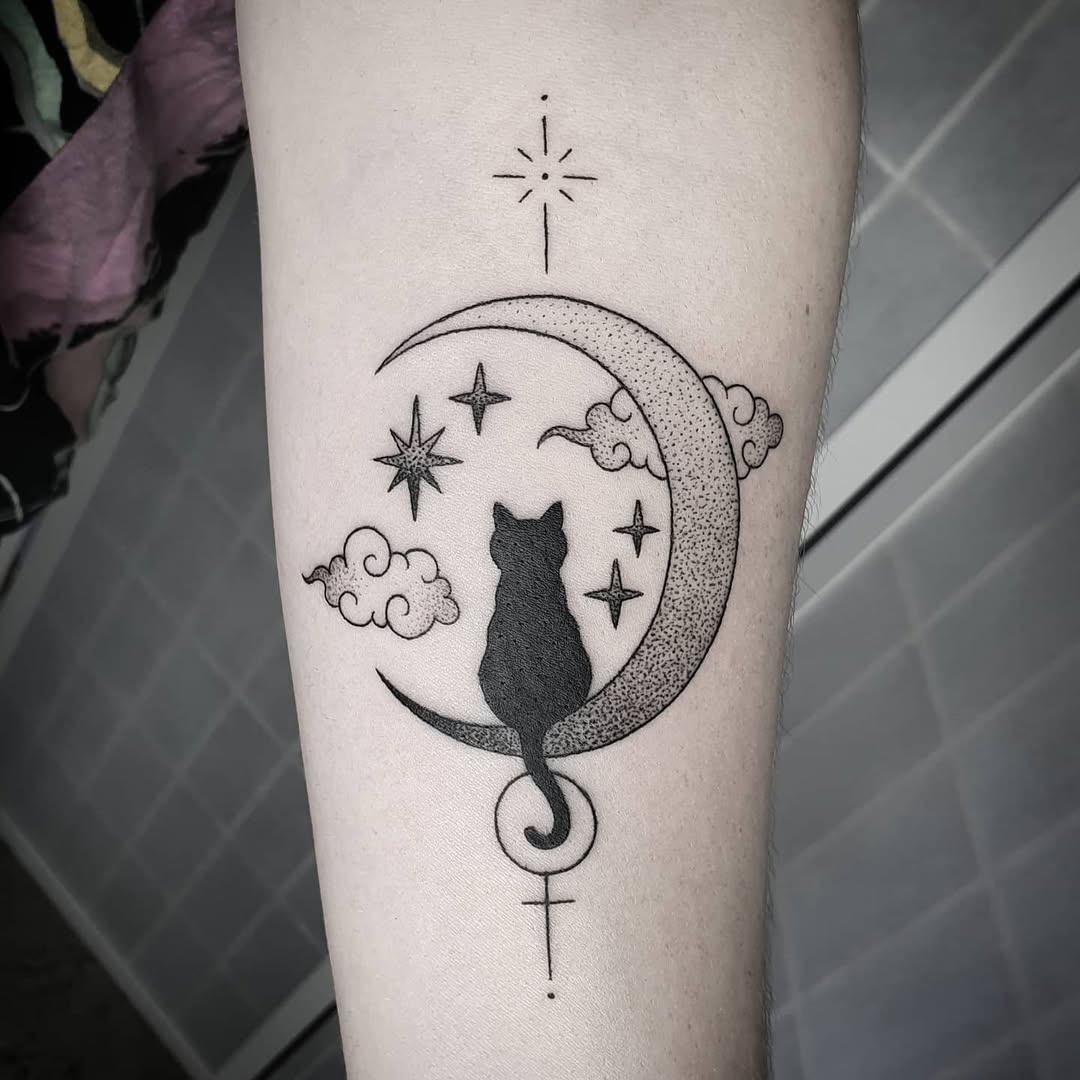 Mystical moon tattoo with a feline silhouette