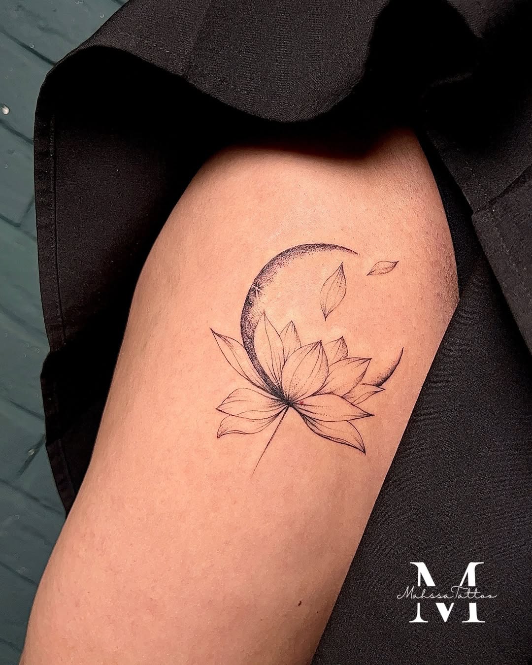 Elegant moon and flower tattoo combination