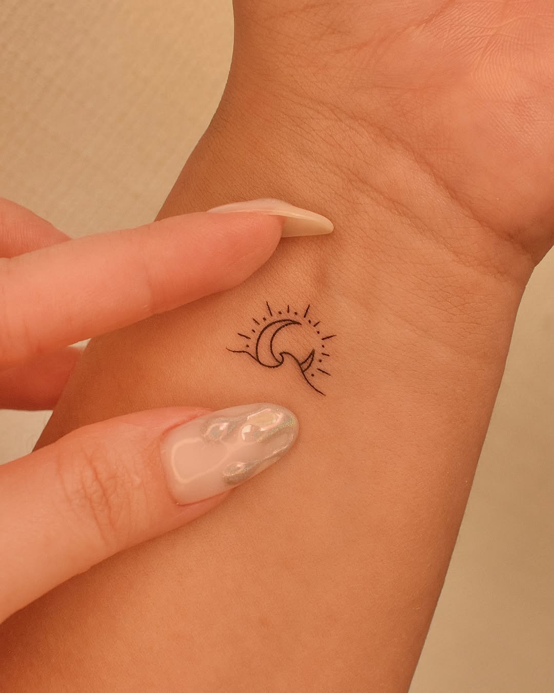 Minimalist moon and sun wave tattoo inspiration