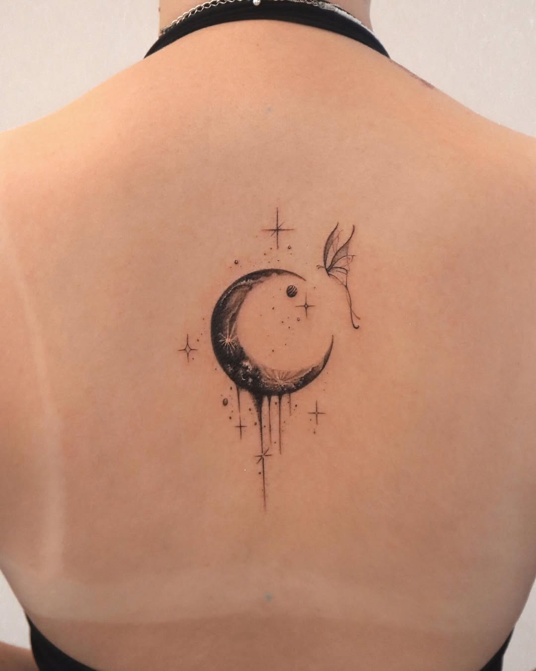 Elegant crescent moon with stars and a butterfly