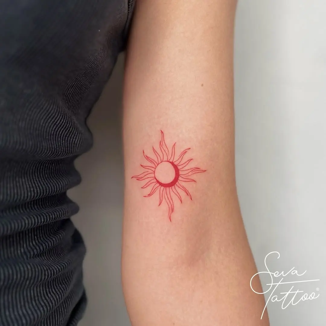 Radiant sun tattoo symbolizes light and energy