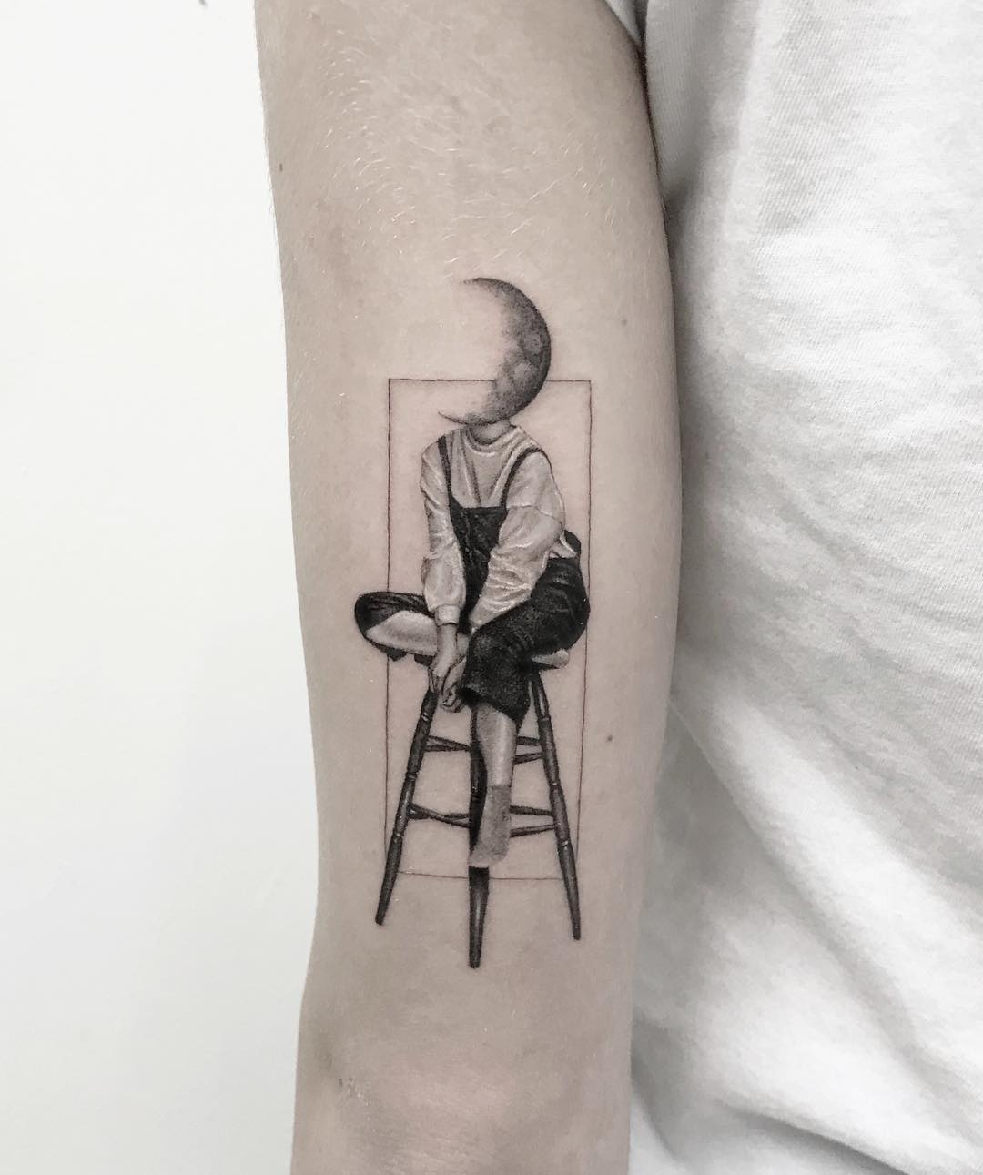 A dreamy moon tattoo with a whimsical vibe