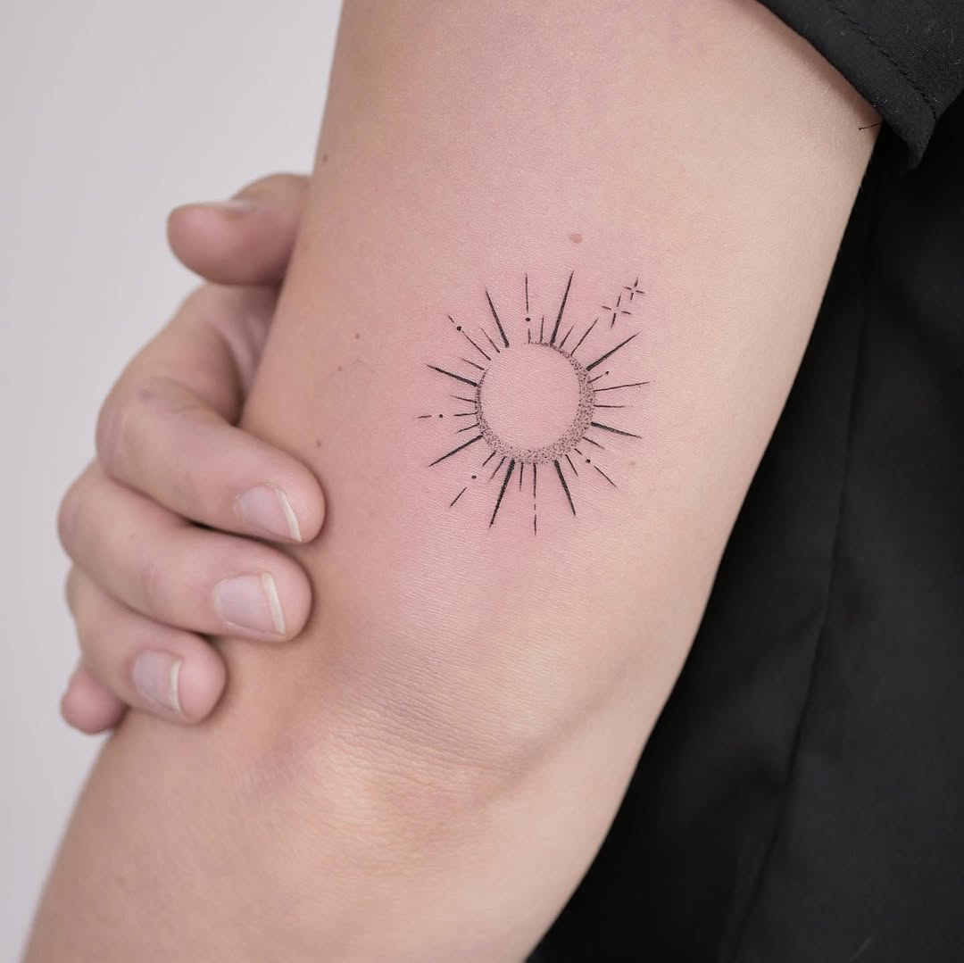 Minimalistic sun and moon tattoo design inspiration