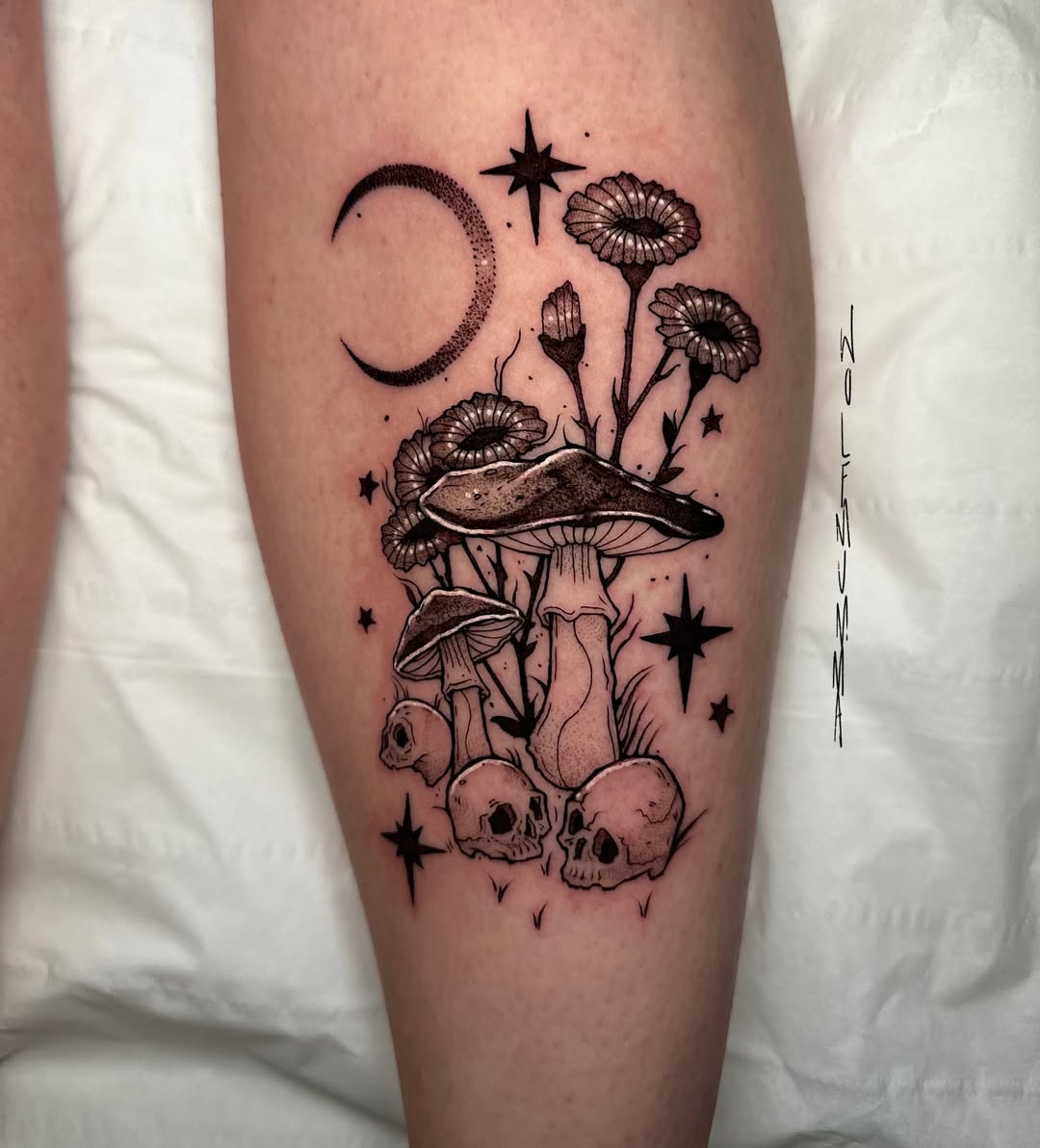 Mystical mushroom and skull tattoo artistry