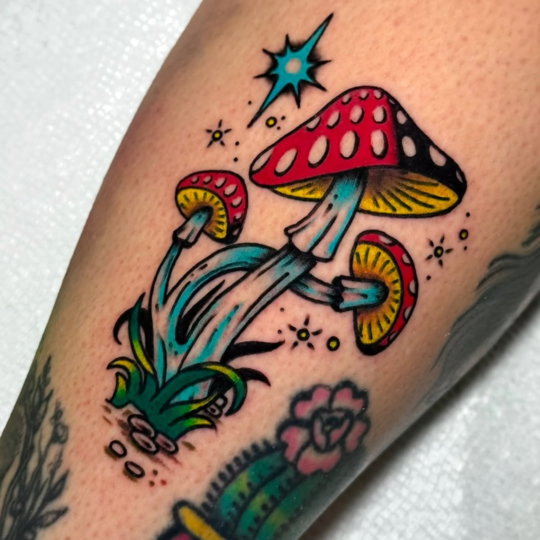 Vibrant mushroom tattoo with whimsical elements