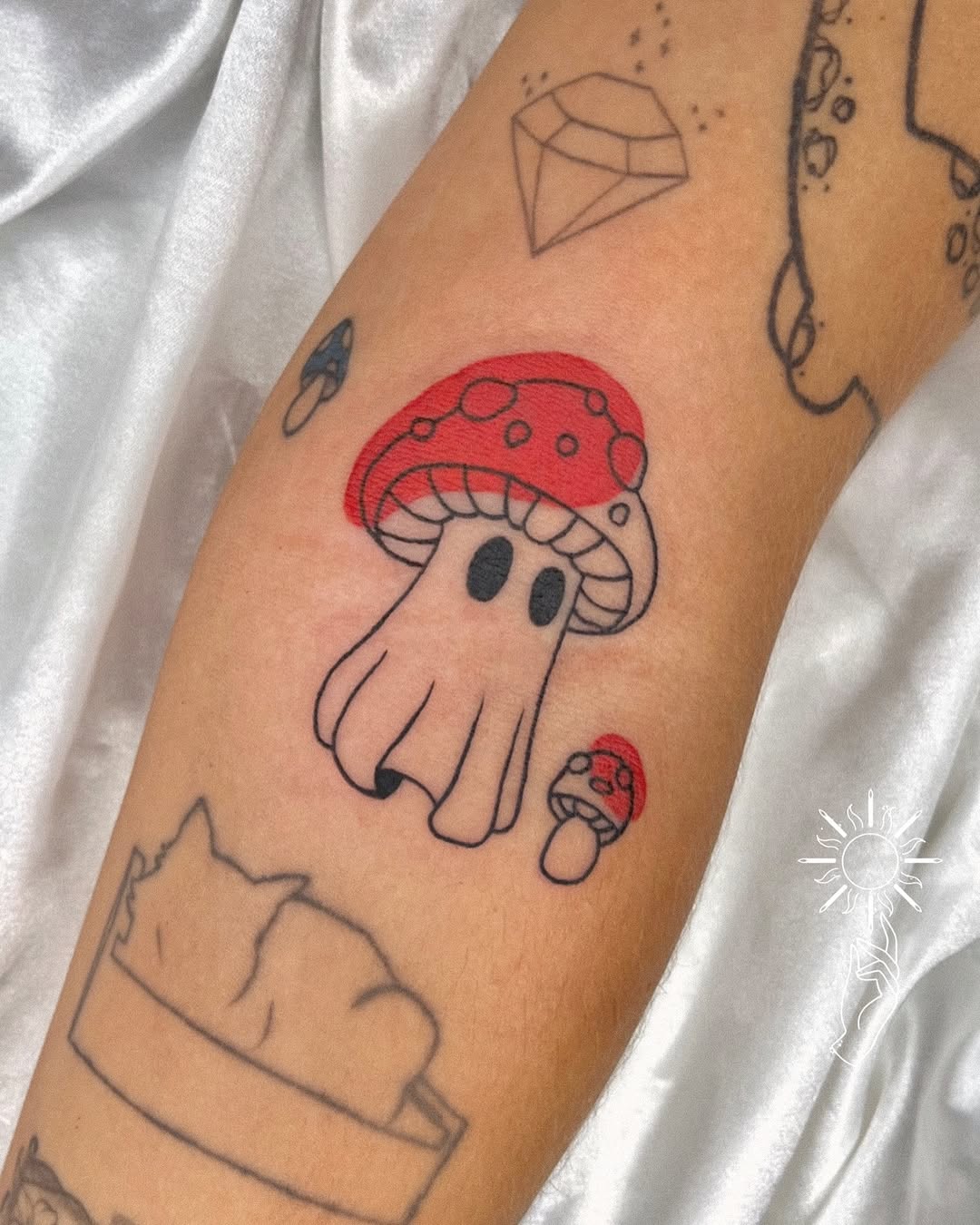 Colorful mushroom tattoos with playful designs