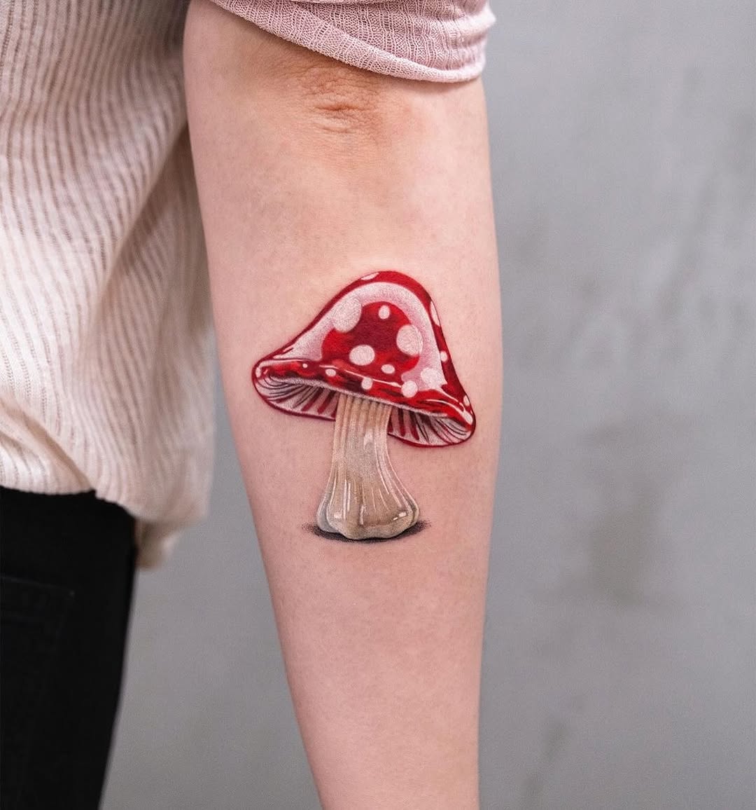 Whimsical Red and White Mushroom Tattoo Design