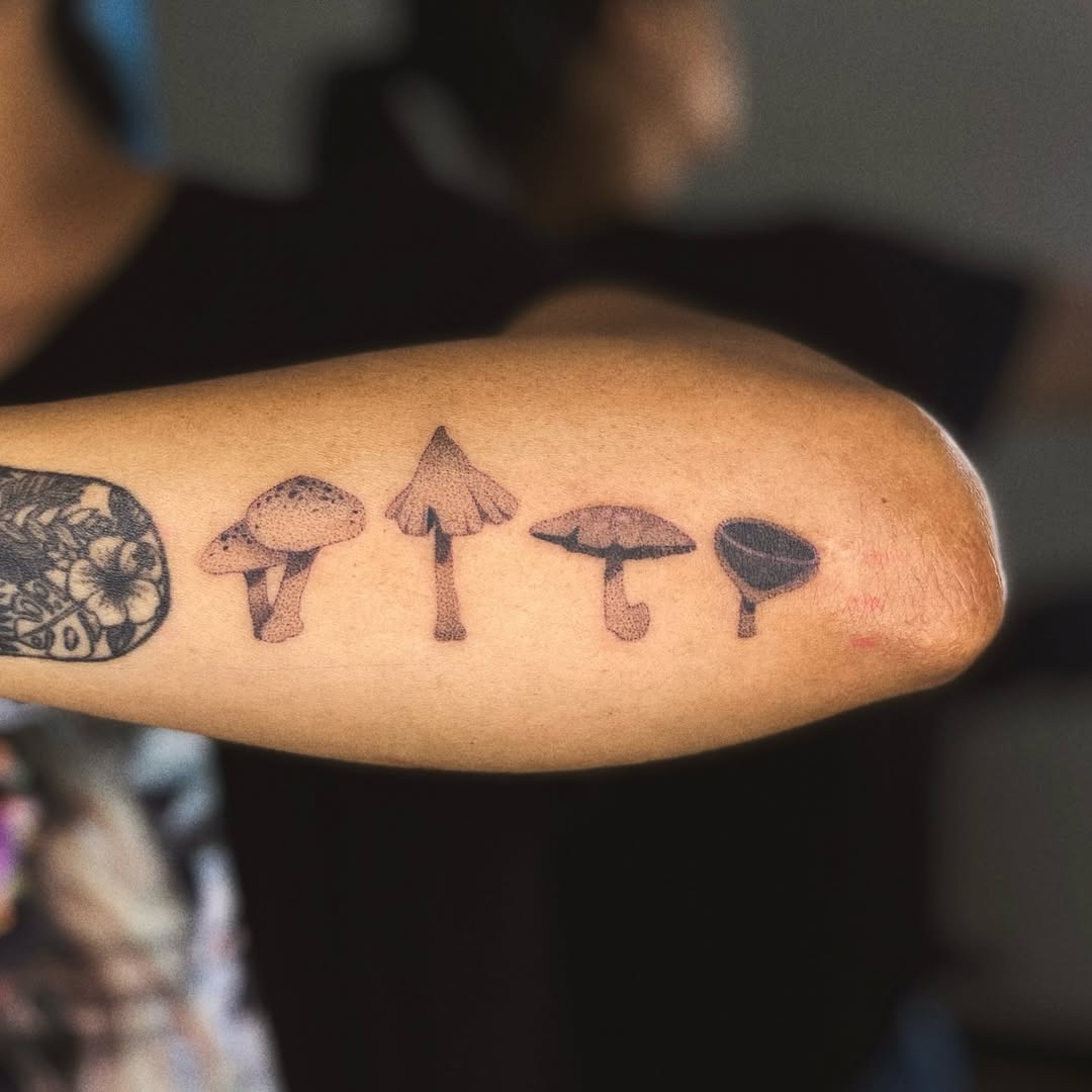 Charming Mushroom Tattoos on the Forearm