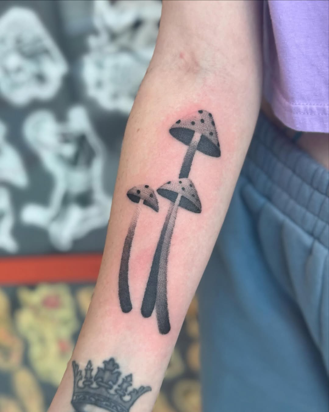 Elegant minimalist mushroom tattoo with black ink