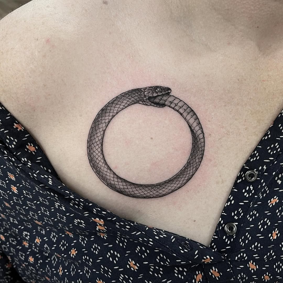 Elegant Ouroboros Tattoo Symbolizing Eternity