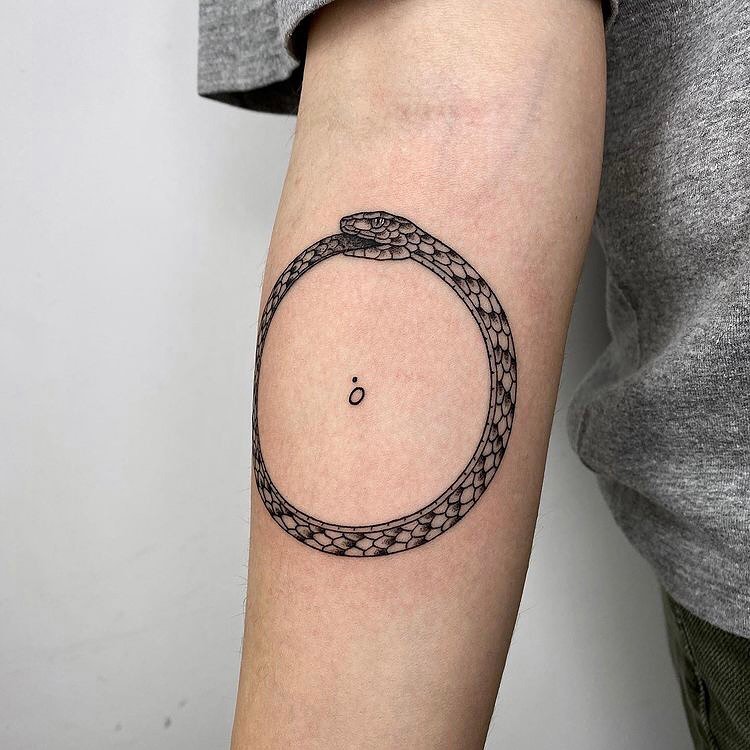 Minimalistic Ouroboros Tattoo Design Idea