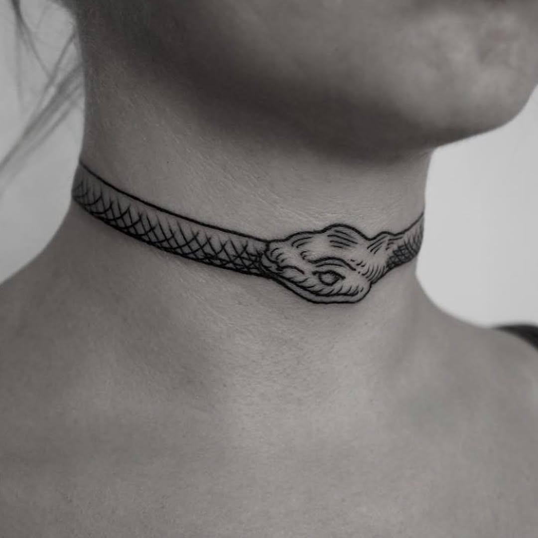 Stylish ouroboros snake tattoo around neck