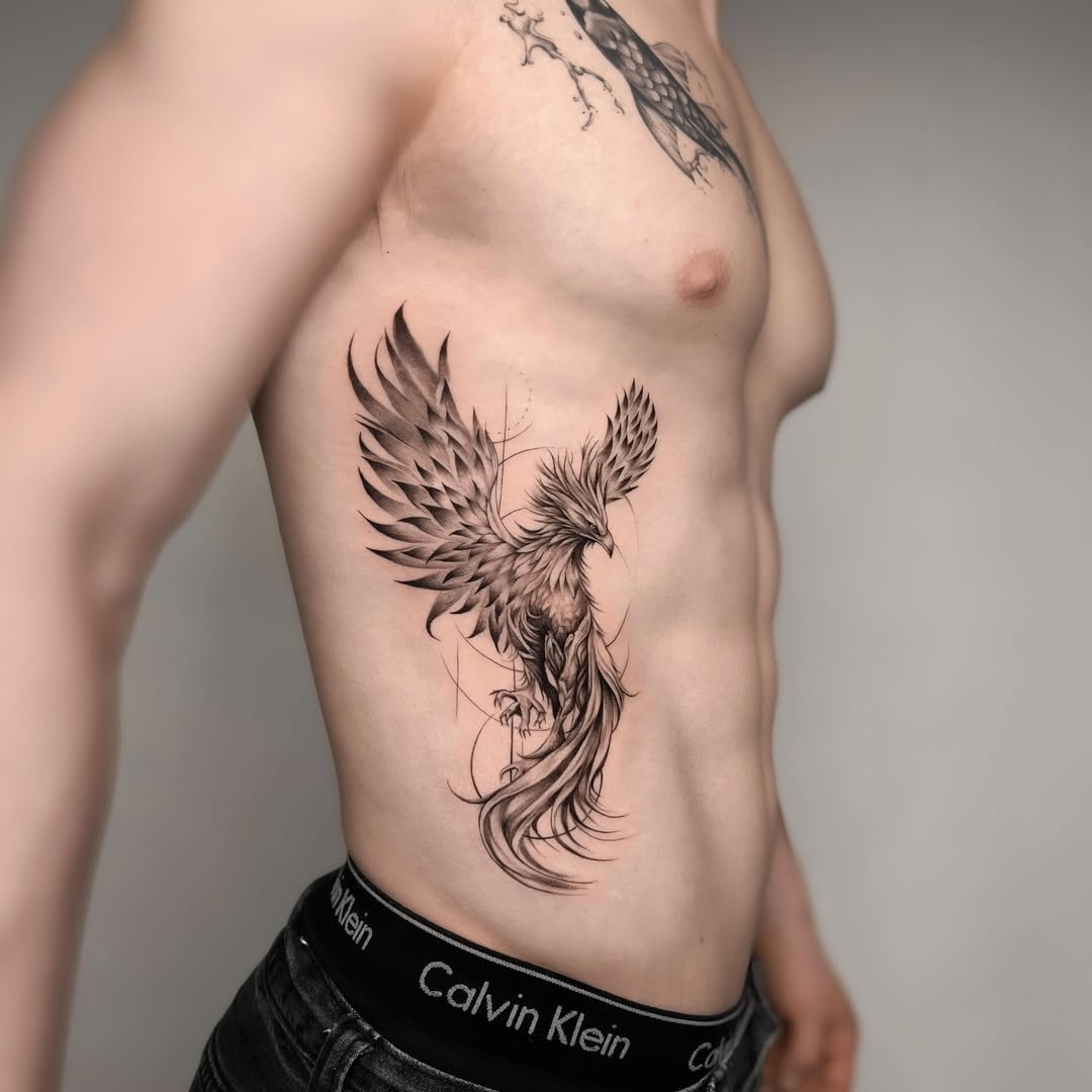 Vibrant phoenix tattoo showcasing rebirth symbolism