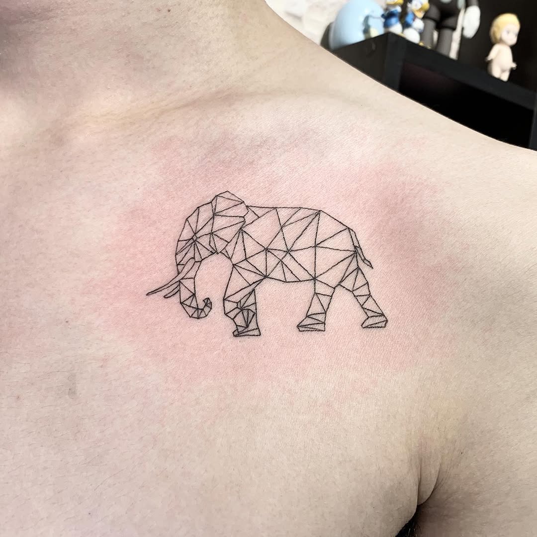 Unique Polygonal Elephant Tattoo on Shoulder