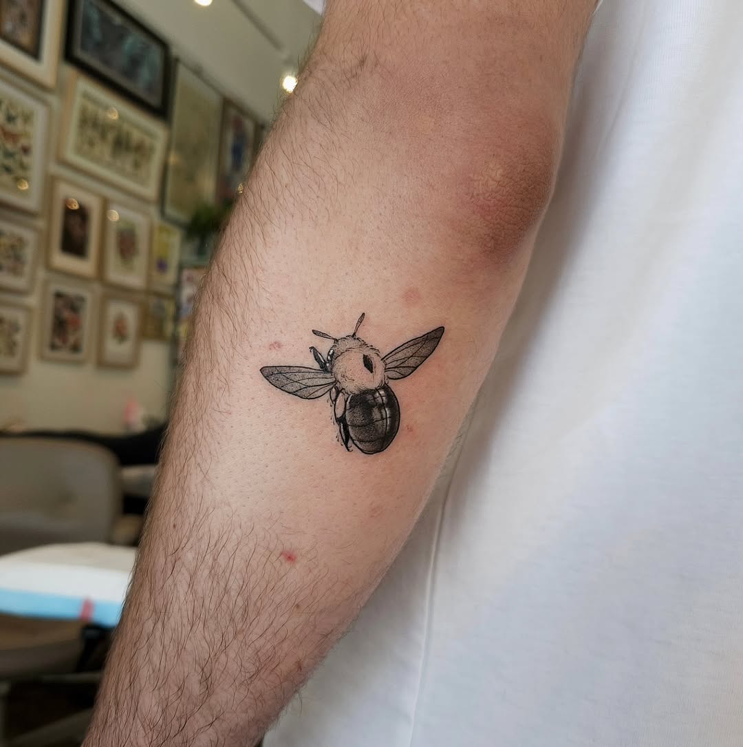 Charming Minimalist Bumblebee Tattoo Design