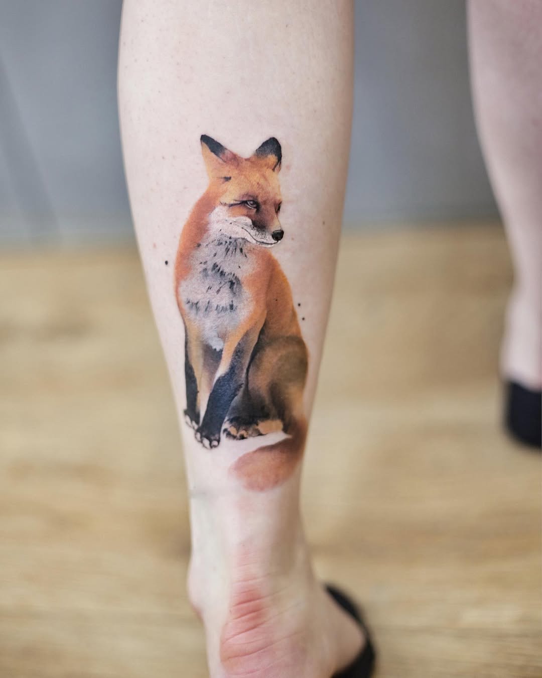 Striking fox tattoo showcasing vivid realism