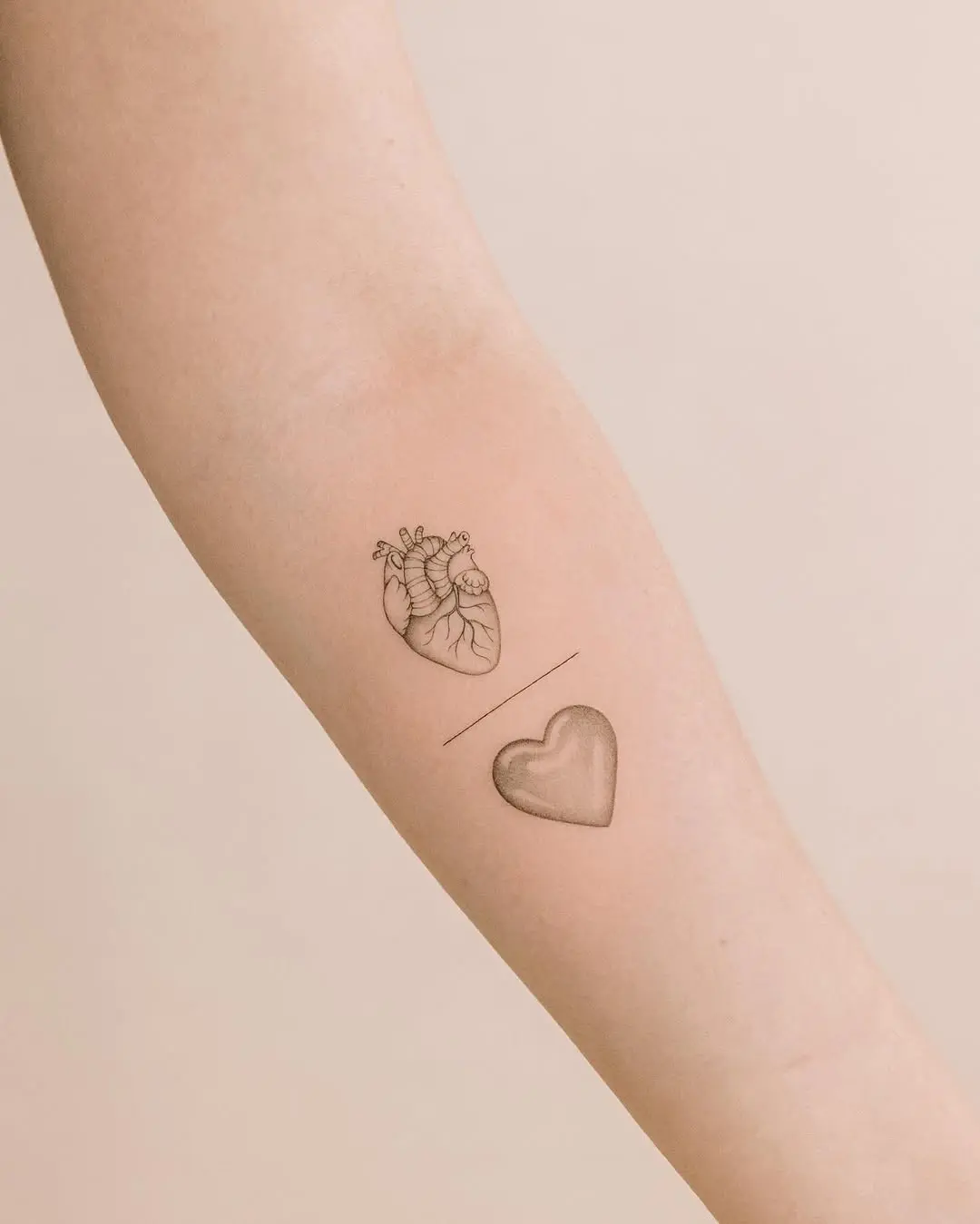 Unique heart tattoo designs on the arm