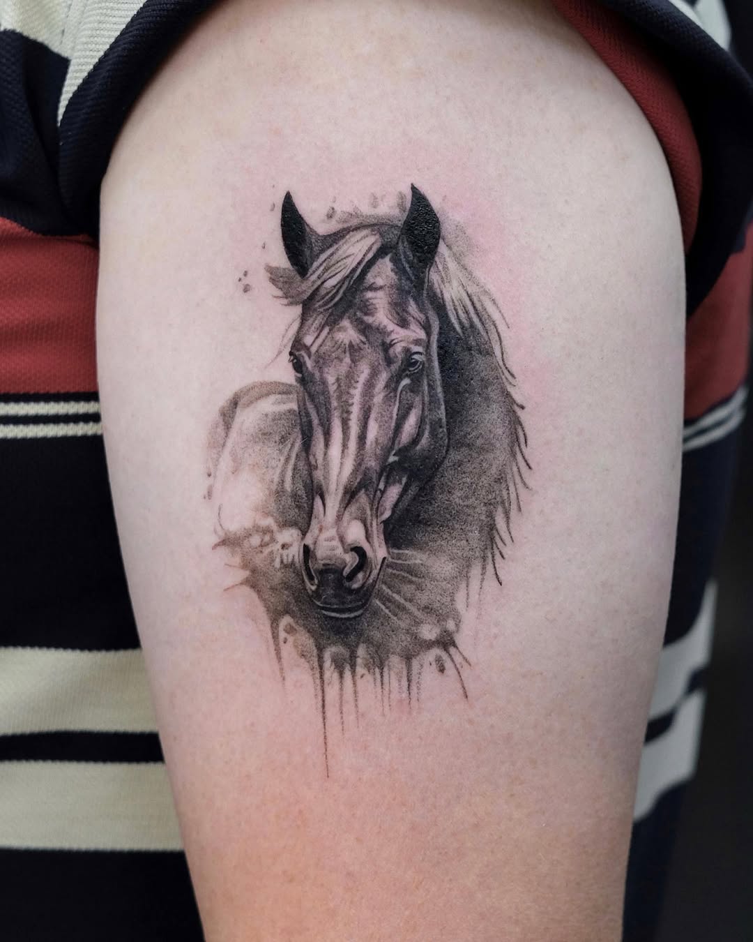 Stunning Black and Gray Horse Artwork on Skin