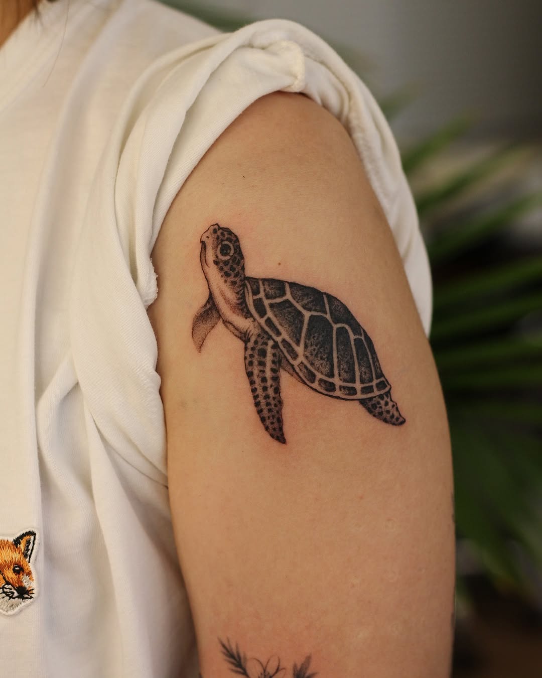 Stunning realistic sea turtle tattoo on arm