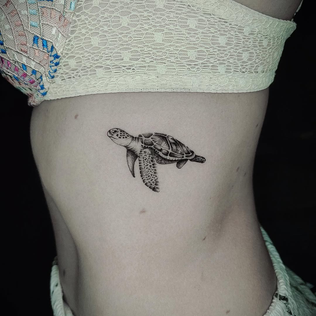 Elegant and realistic sea turtle tattoo design