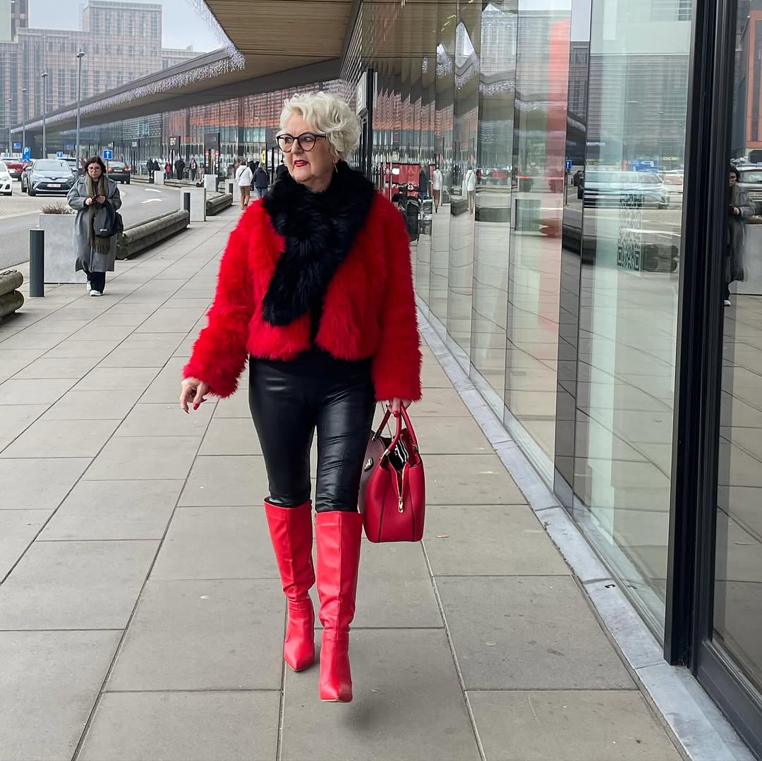 Chic red boots elevate edgy urban style