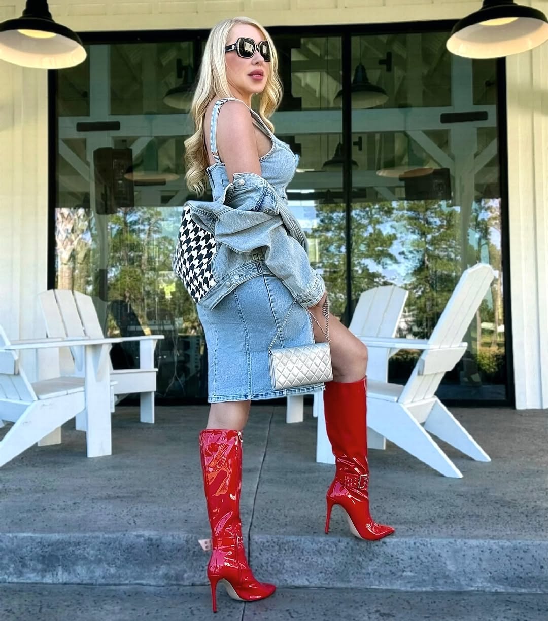 Chic denim dress paired with bold red boots