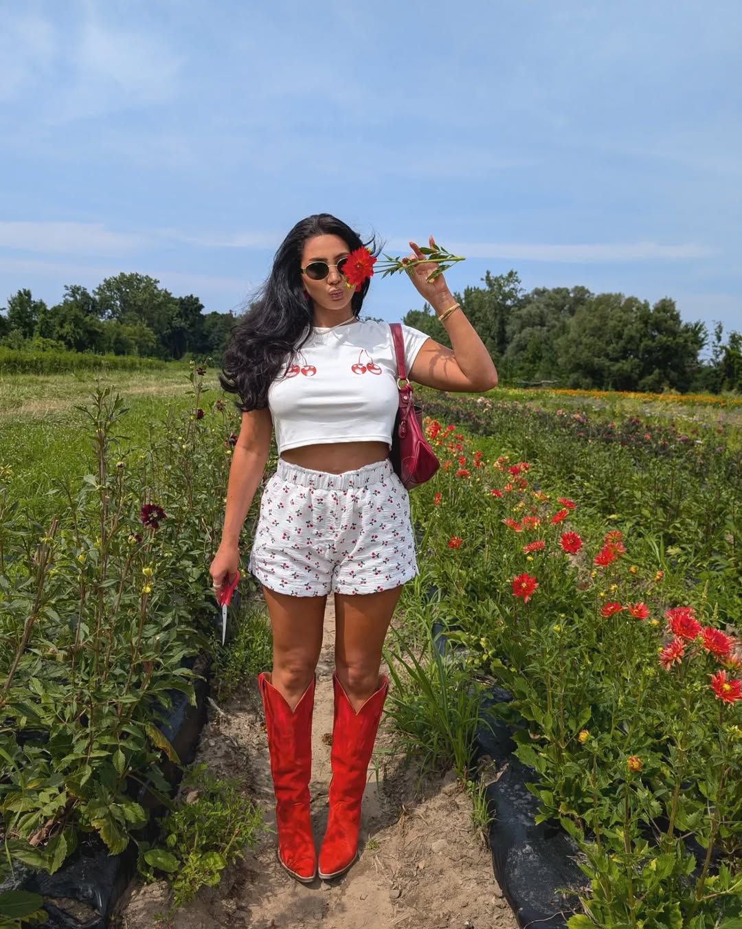 Chic Summer Styling with Vibrant Red Boots