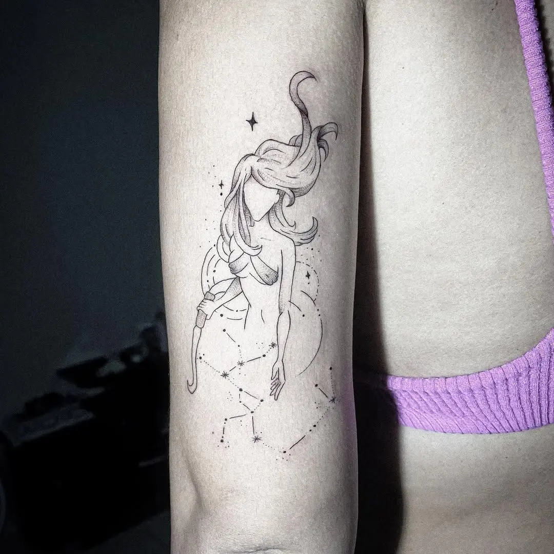 Elegant Sagittarius tattoo blending art and astrology