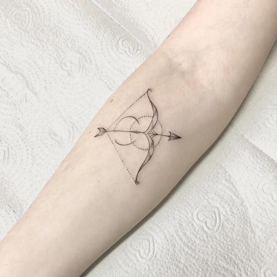 Minimalist Sagittarius Tattoo with Celestial Elements