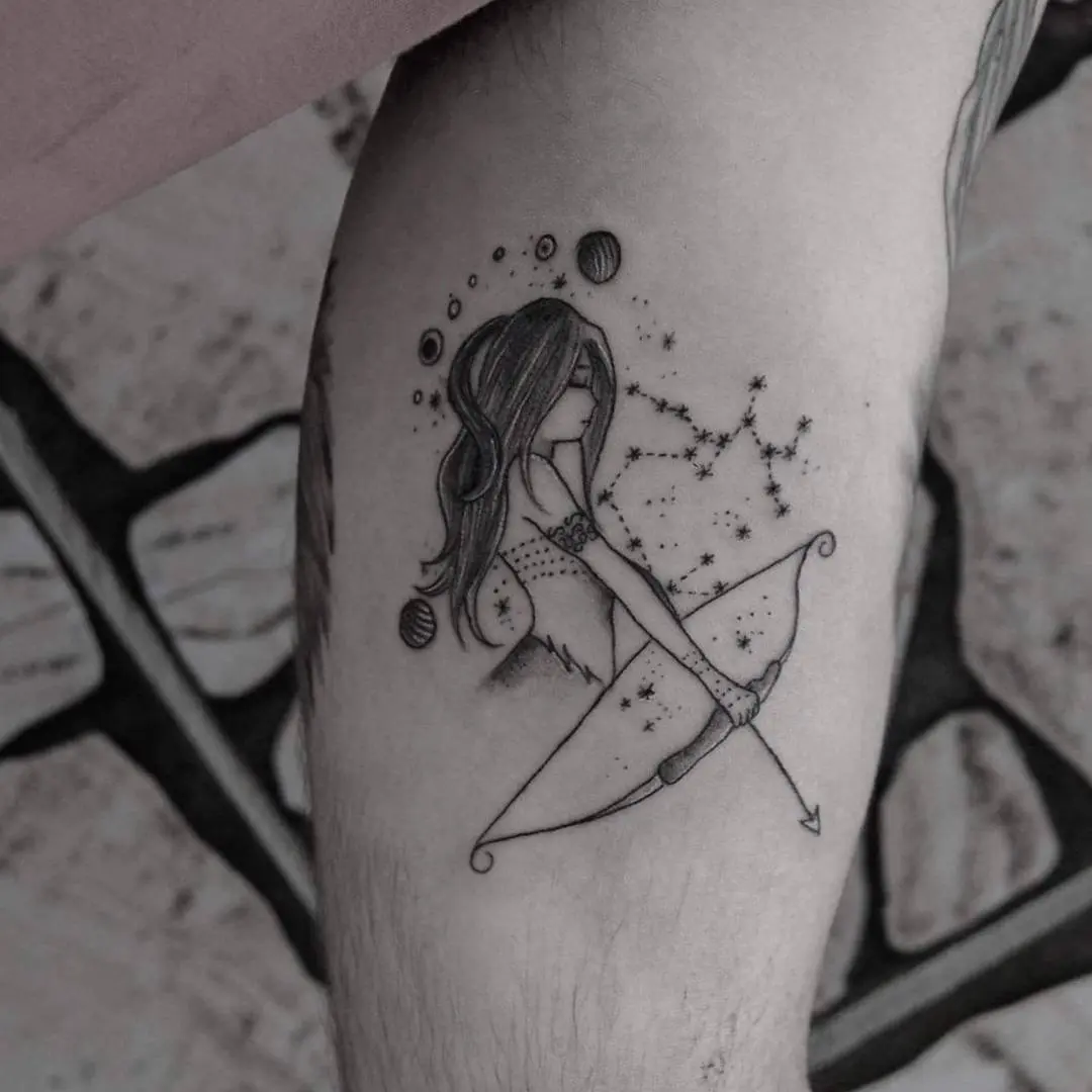 Feminine Sagittarius tattoo with cosmic elements