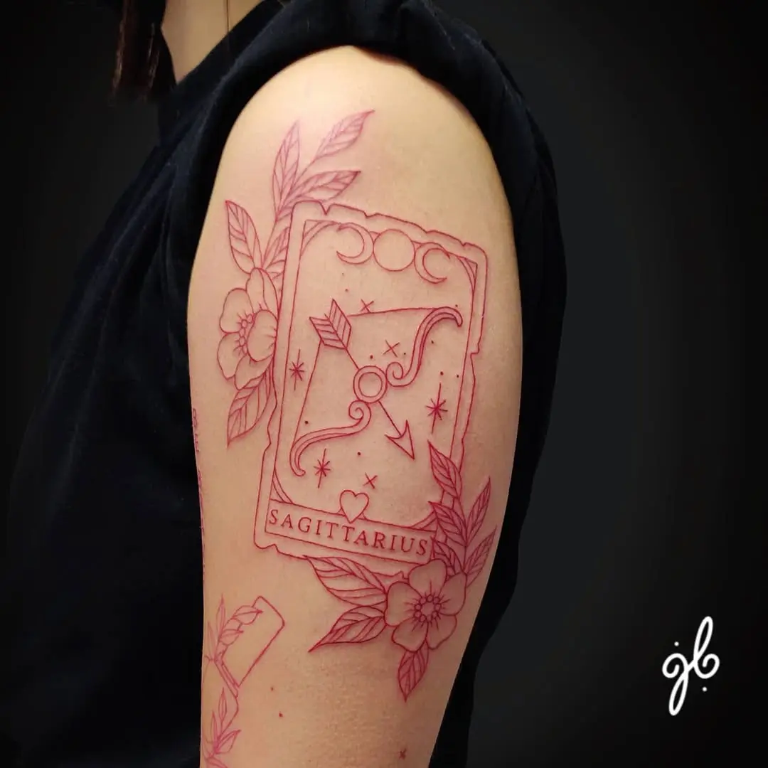Beautiful Sagittarius tattoo with floral elements