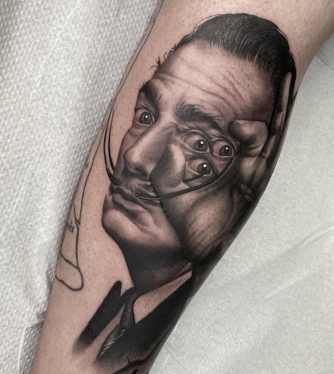 Intricate portrait tattoo with surreal details