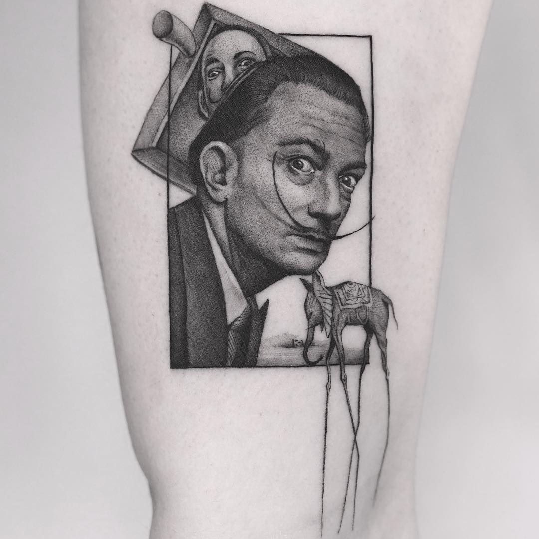 Intricate Salvador Dali portrait inked on skin