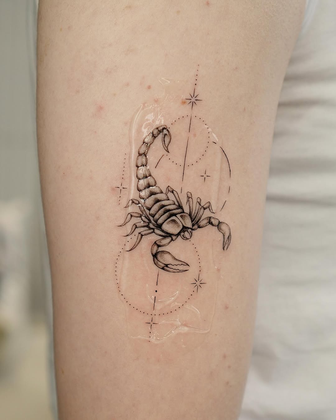 Bold Scorpio Tattoo with Star Alignments