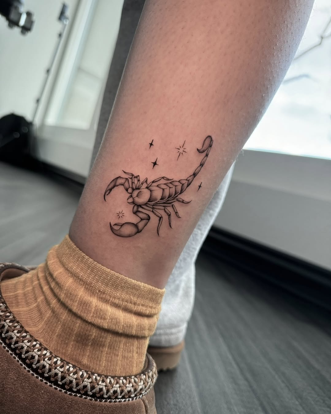 Striking Scorpio Tattoo with Celestial Elements