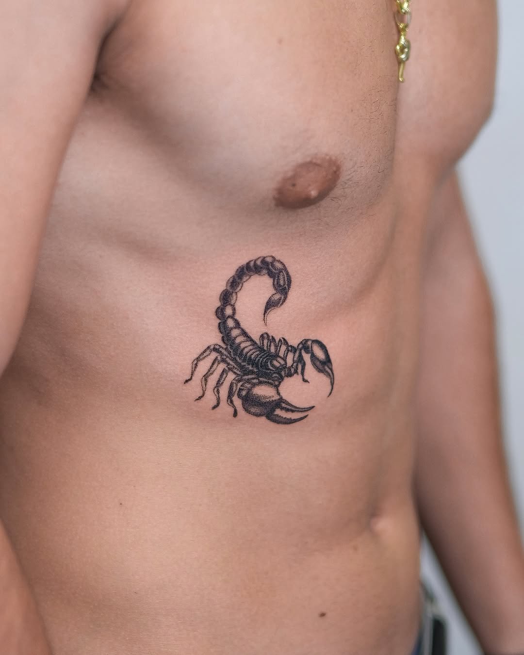 Fierce Scorpio Tattoo on Male Rib Cage