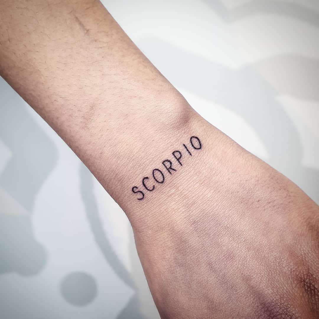 Minimalist Scorpio Tattoo on Wrist