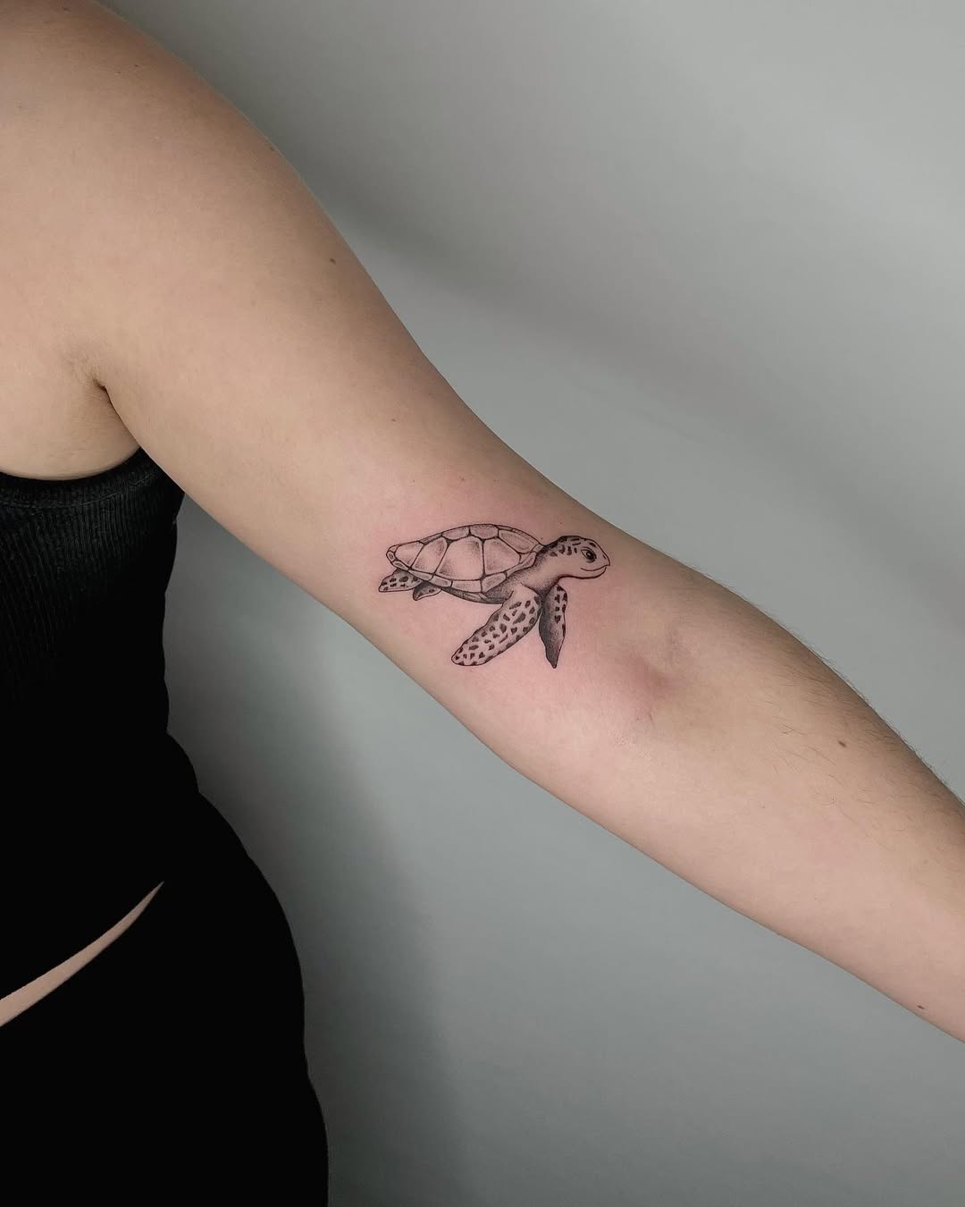 Minimalist Turtle Tattoo Design on the Arm