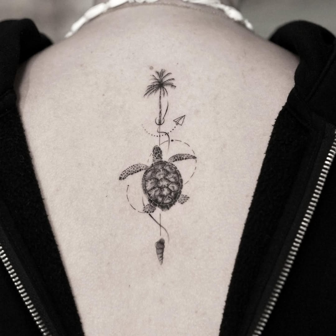 Stylish turtle tattoo with a travel theme